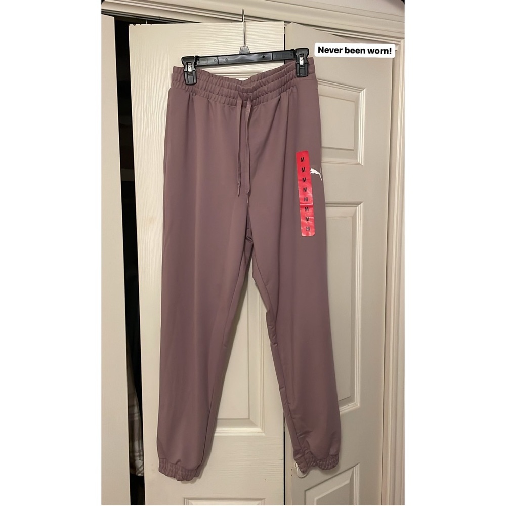 Never worn, pink puma light weight sweatpants